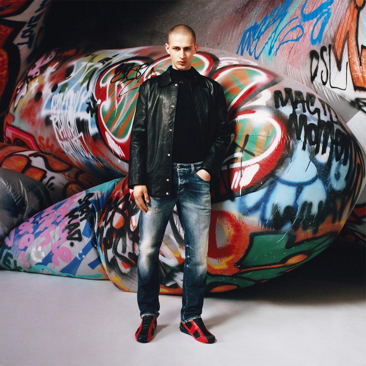 A man wearing Diesel jeans