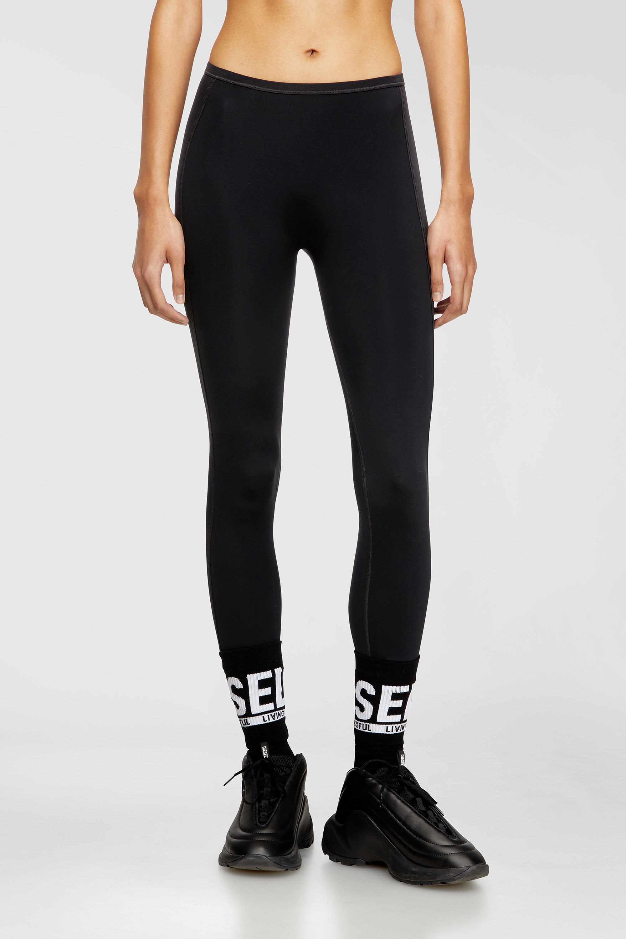 Diesel - MEREDITH-UTLT, Woman's Nylon leggings with cut-out back Oval D in Black - 2