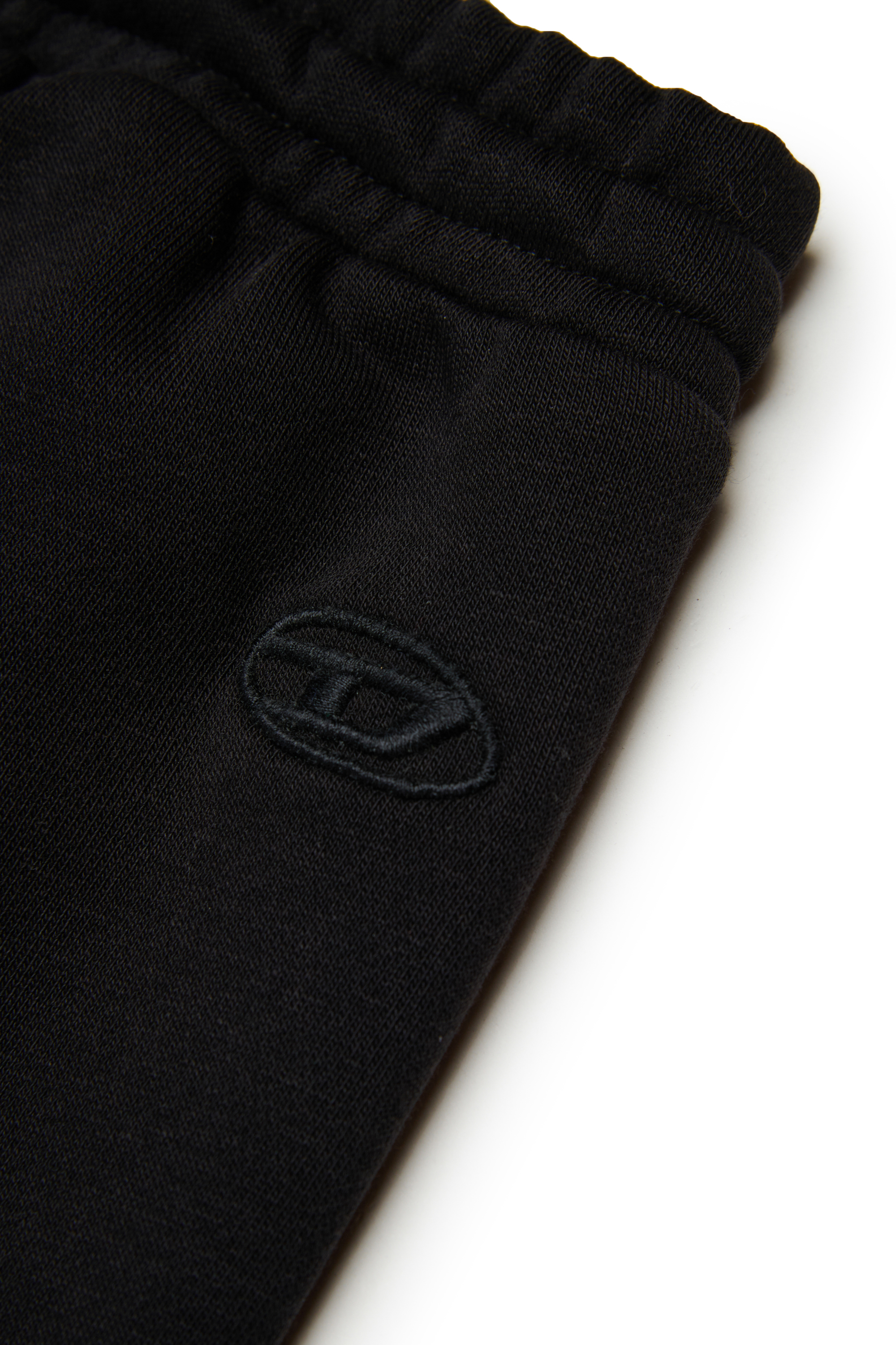 Diesel - PLUTUS, Man's Cargo sweatpants with pockets in Black - 4